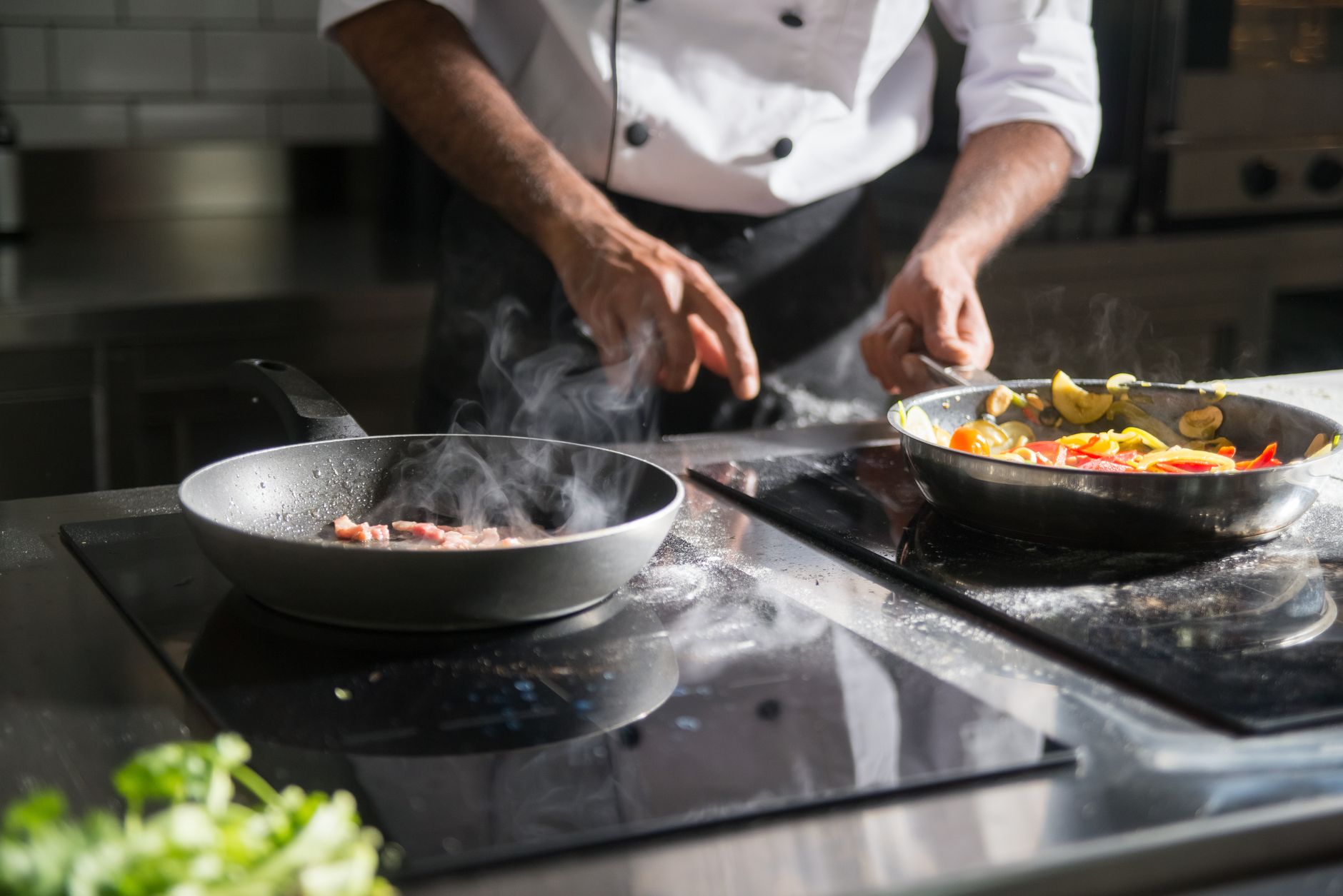 a stainless steel Instant Pot sitting on a granite kitchen countertop